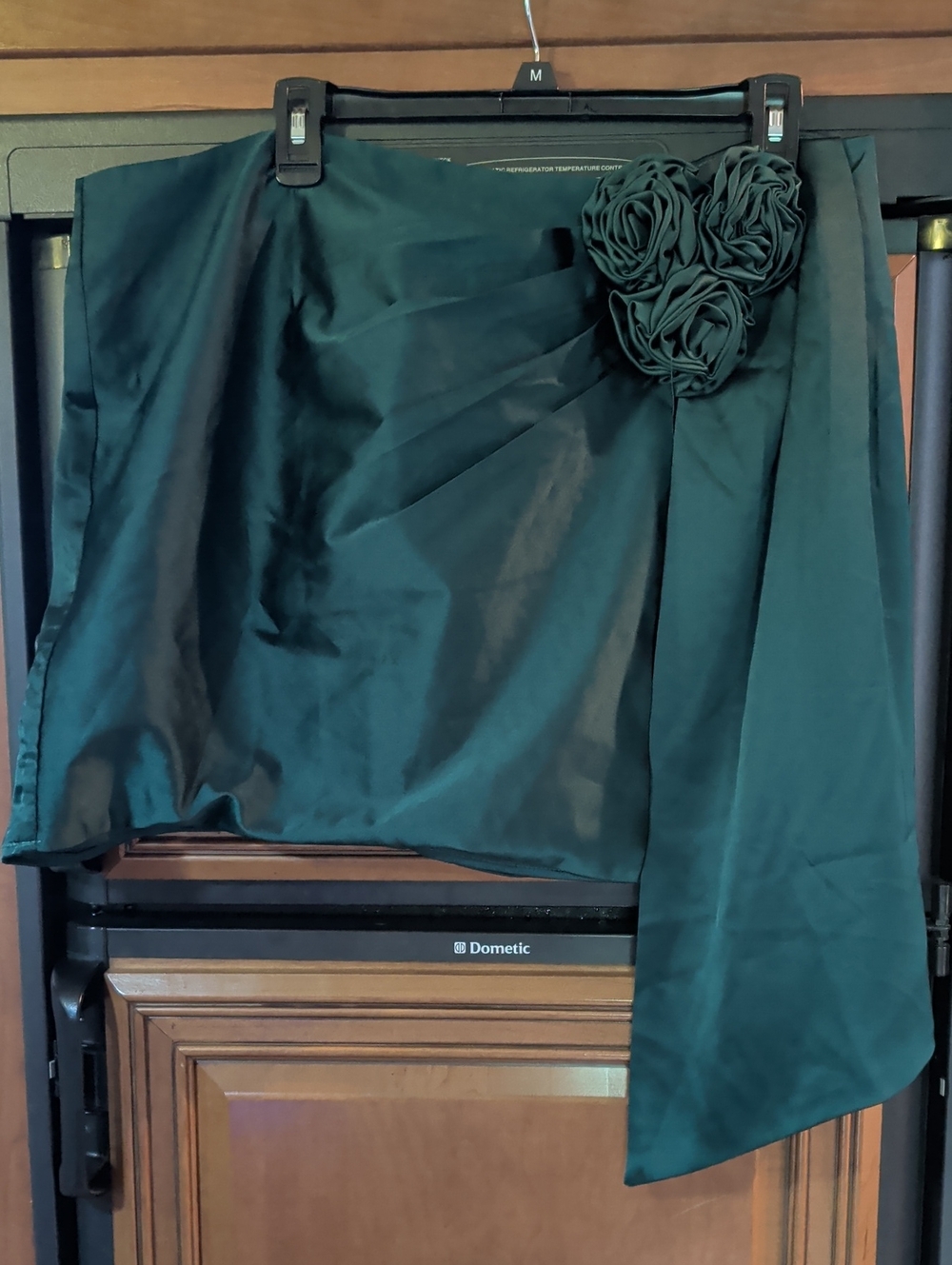 Fashion Nova Dark Green Satin Mini Skirt with Rosette Detail
